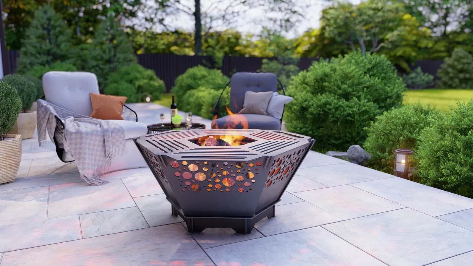 Palenisko HEXAGON 5w1 z ornamentem kółka — wieczorem na patio